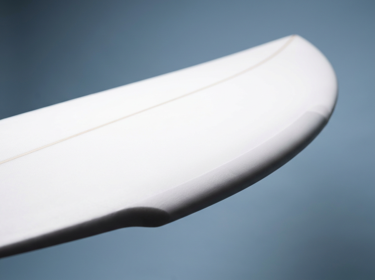 Close-up of a shortboard rail and thickness profile